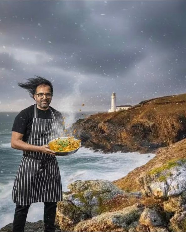 Reggie on the Cornish clifftops with a pan of biryani